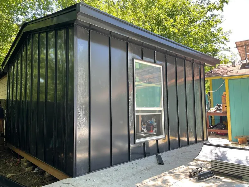 Black standing seam metal wall panels for Metal Roof Installation in West Greenwich